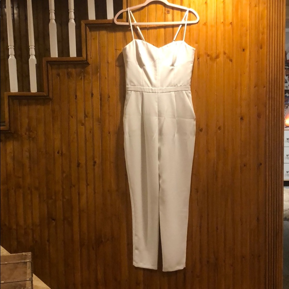 White jump suit